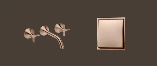 Schalter im Programm LS ZERO in der Metallausführung Bronze gebürstet und die Armatur Vaia von DORNBRACHT.