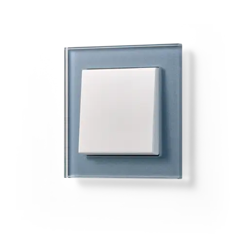 Push-button in the A CREATION programme made of glass, photographed from a slight perspective