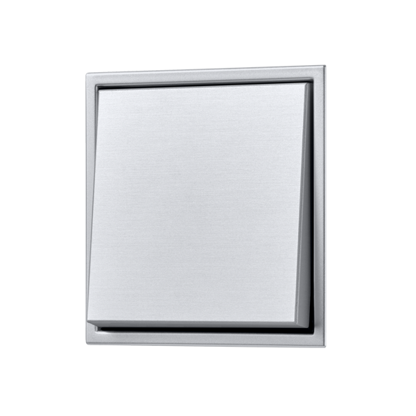Push-button in the LS ZERO range made of aluminium, photographed from a slight angle