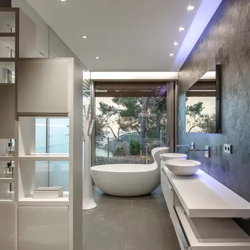 The KNX push-buttons and sockets from the JUNG LS 990 switch range in stainless steel fit harmoniously into the high-quality architecture.