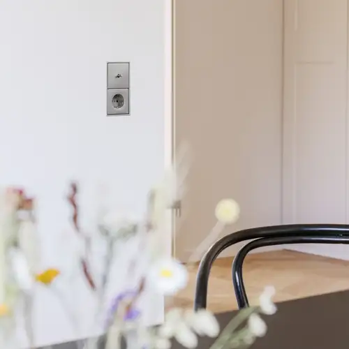 LS 1912 toggle switch and SCHUKO® socket outlet, ambient recording in the Lörrach reference object