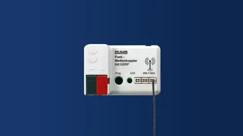 KNX media coupler against a blue background