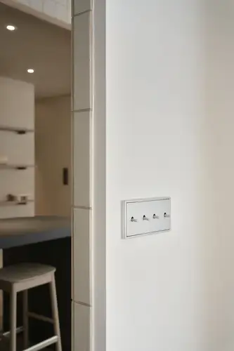 Toggle switch in the LS 1912 range in aluminium, ambience shot at GoodPost Studio.