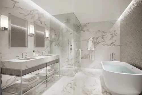 Luxurious marble-look bathroom with shower and free-standing bathtub.
https://www.kallista.com/articles/luxury-shower-ideas