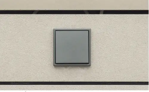 Dunkelgrau lackiertes Aluminium gibt dem JUNG LS 990 in Anthrazit seine besondere Wirkung.