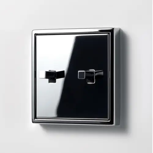 Toggle switch 2-fold in the 1912 programme made of polished chrome, with a cubic toggle lever.