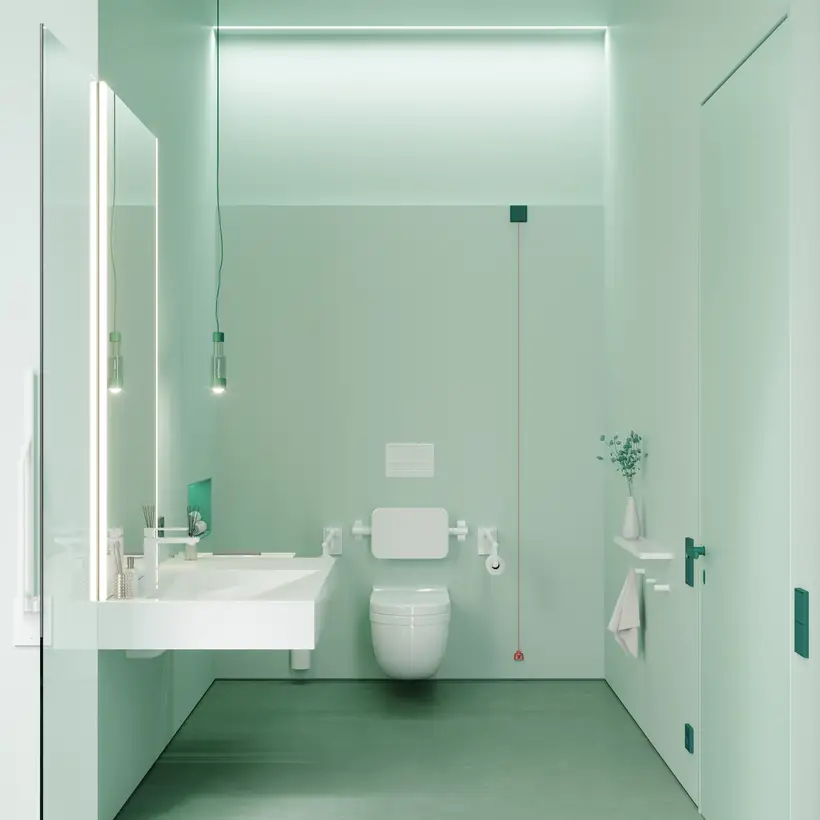 Barrierefreies Tageslichtbad im freundlichen Mintgrün mit Elektroausstattung und passendem Notrufsys-tem von JUNG aus dem Programm LS 990 im Farbton 32040 vert anglais