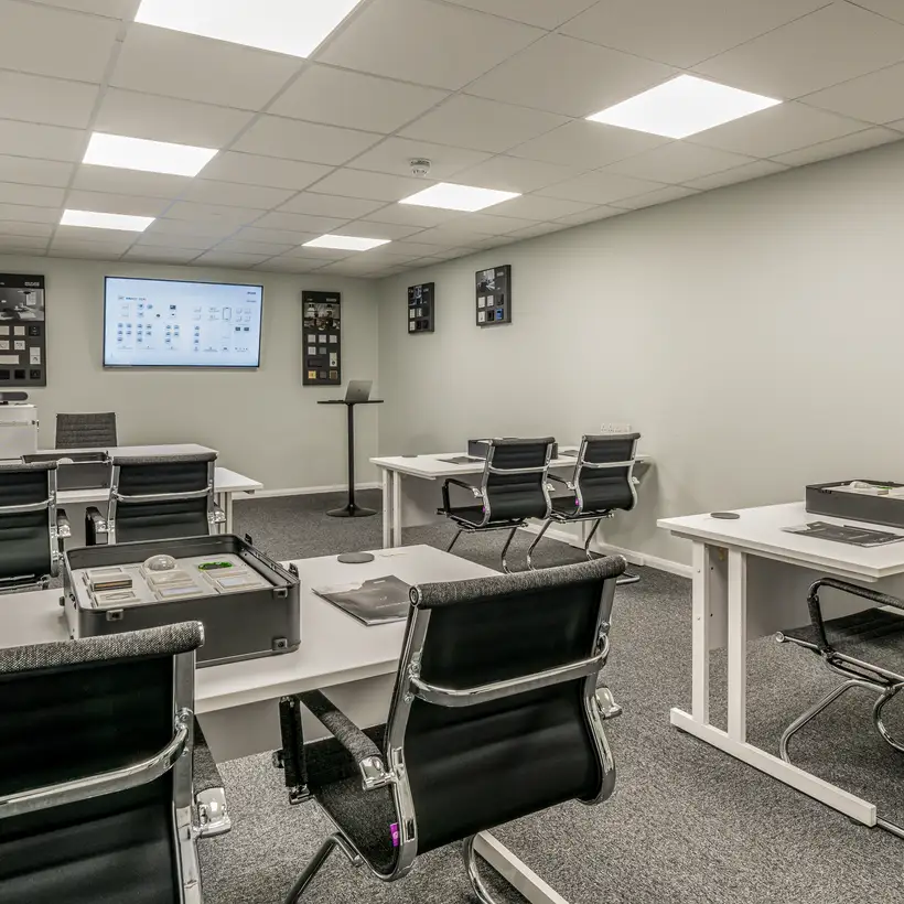 Photograph of the training room in the JUNG training centre in London.