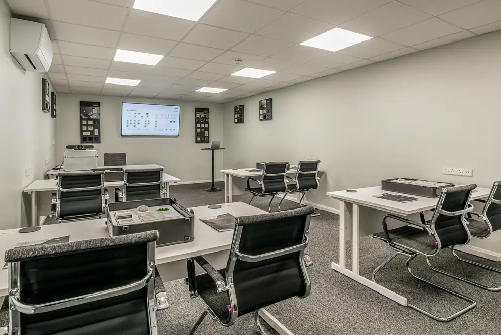 Photograph of the training room in the JUNG training centre in London.
